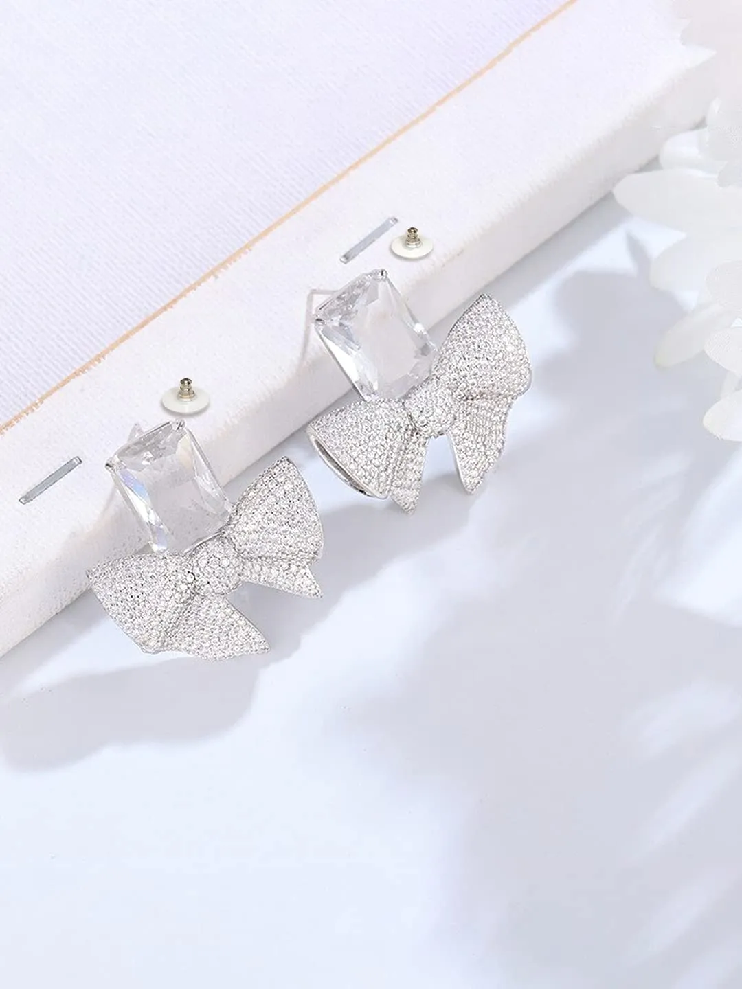 Yellow Chimes Earrings For Women Silver Tone Crystal Studded Bow Knot Shape Stud Earrings For Women and Girls